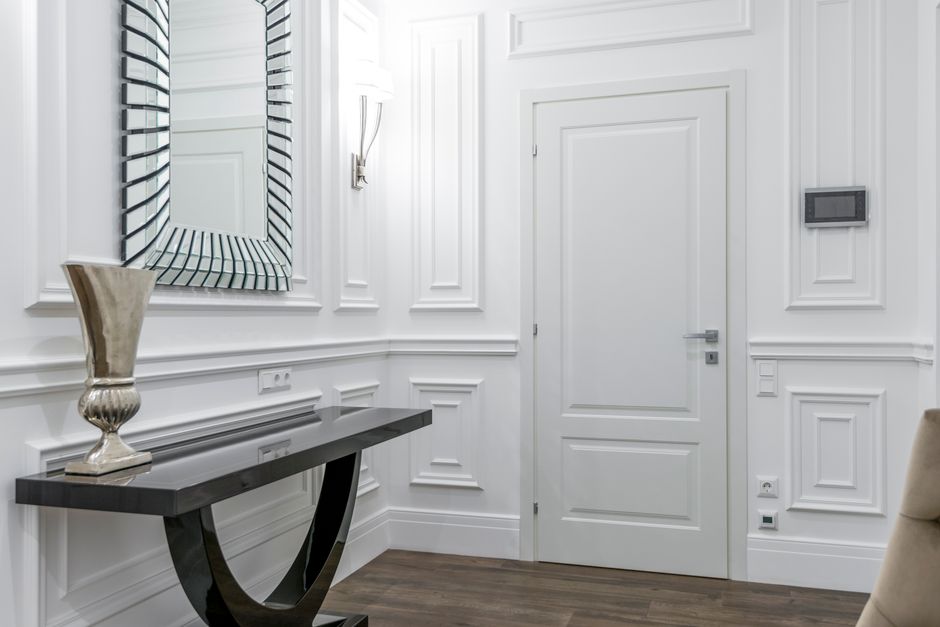 Modern home entrance featuring a premium entry door